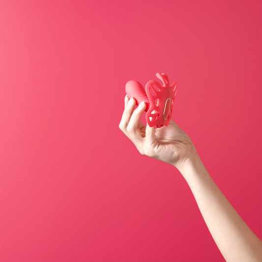 Butterfly Effect 12-Function Panty Vibrator in hand