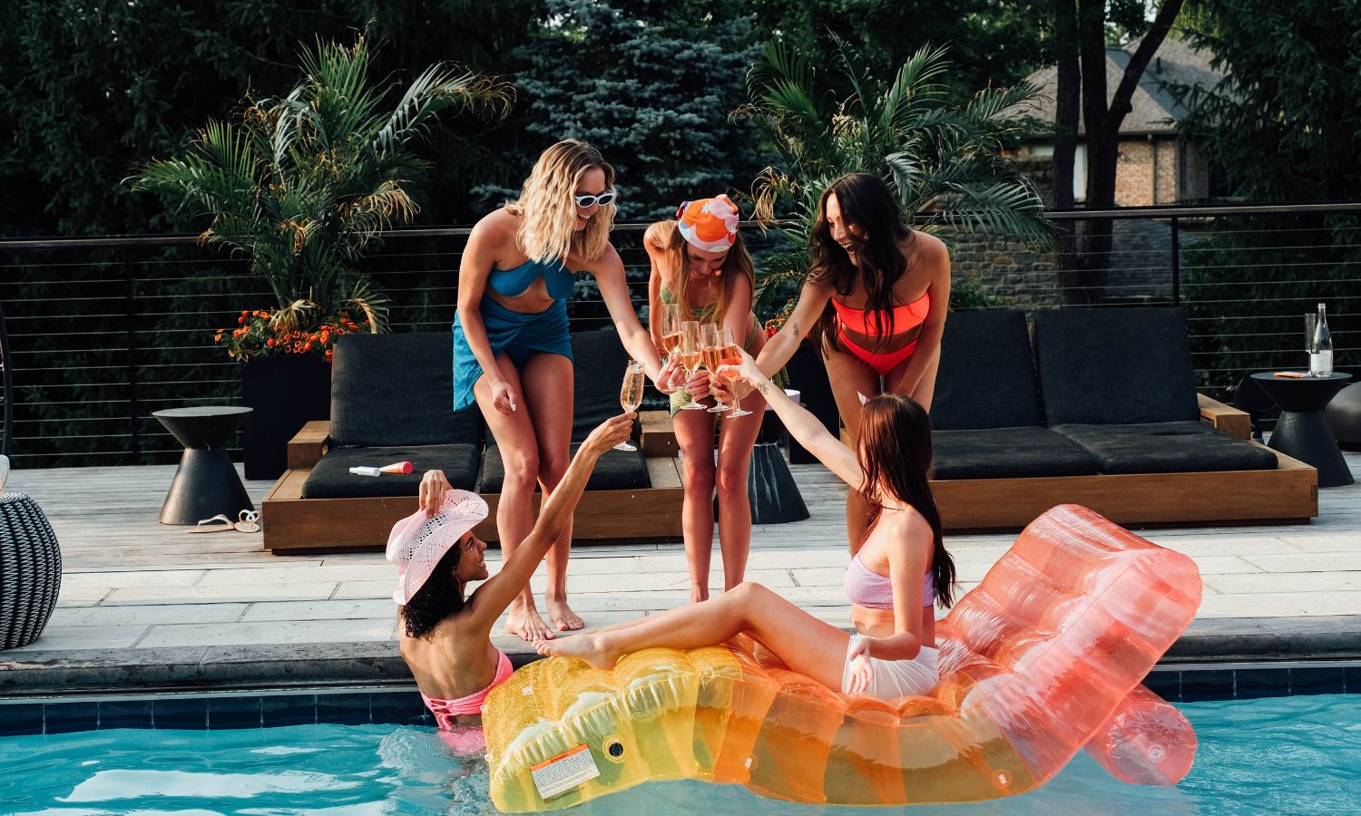 Summer essentials including bath and body products, sunglasses